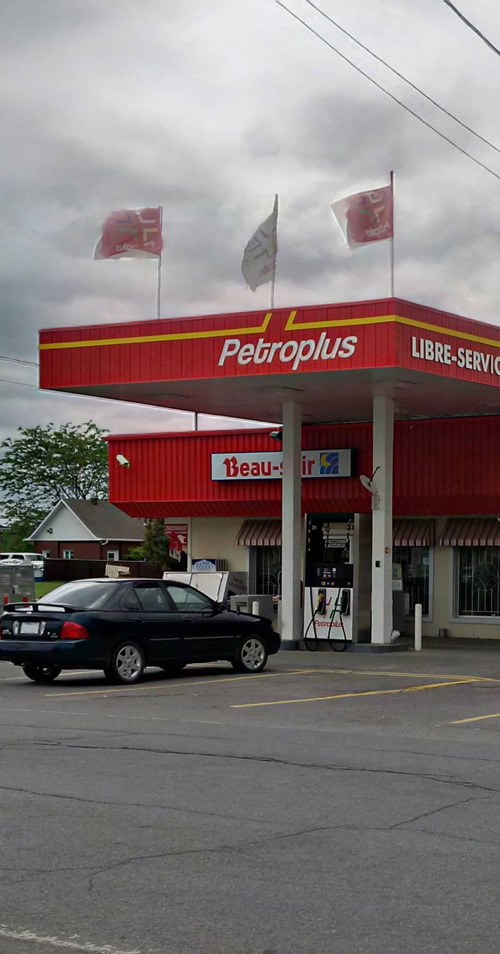 A car parked at a Petroplus station